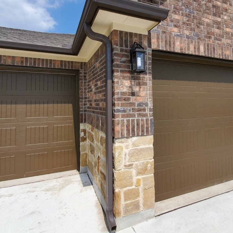 After installing our seamless gutters, the next step is choosing the right material to further enhance your home's protection and aesthetic appeal.